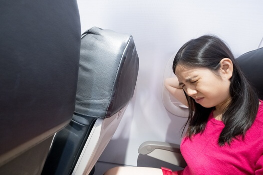 Flying with Back Pain - Keeping Your Back Healthy During Plane Travel -  Amateur Traveler